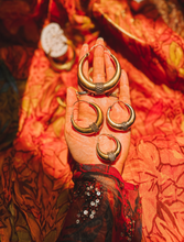The golden tribal brass hoop earrings comes in all hese beautiful sizes.