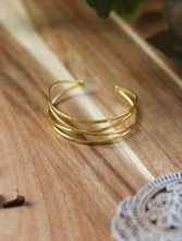 Zoya Criss-Cross Brass Cuff